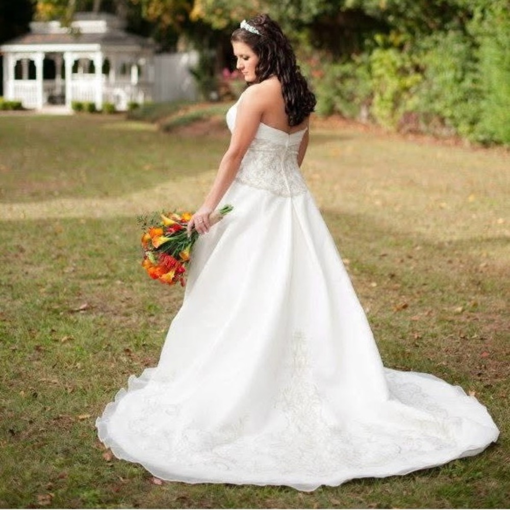 Elegant White Strapless Wedding Dress by Alfred Angelo